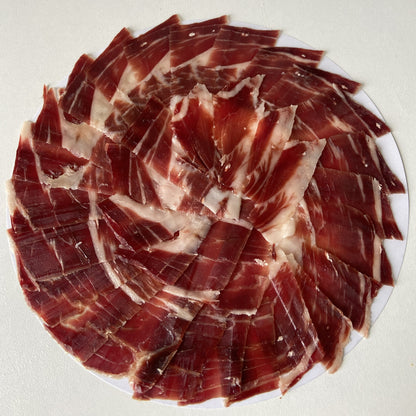 Pjaustytas peiliu Jamón de Bellota 100% Ibérico